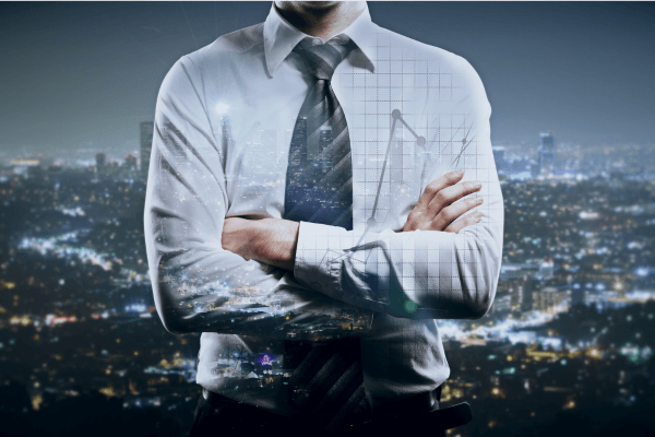 Business professional with arms crossed and a city skyline double exposure overlay, representing an employer or DER responsible for managing DOT reasonable suspicion drug and alcohol testing compliance.